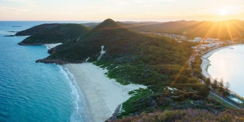 Story-based intervention - My Holiday at Seaside Holiday Resort in Fingal Bay  -  View from Mt Tomaree towards Fingal Bay and Shoal Bay at sunset