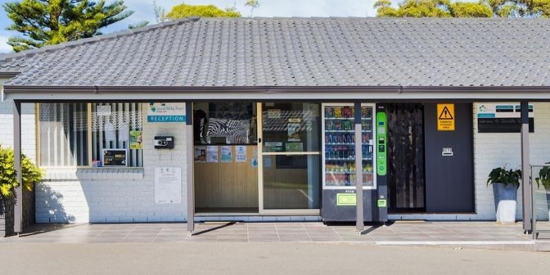 Story-based intervention - My Holiday at Seaside Holiday Resort in Fingal Bay  - Accessible office with after-hours key collection box and key drop slot