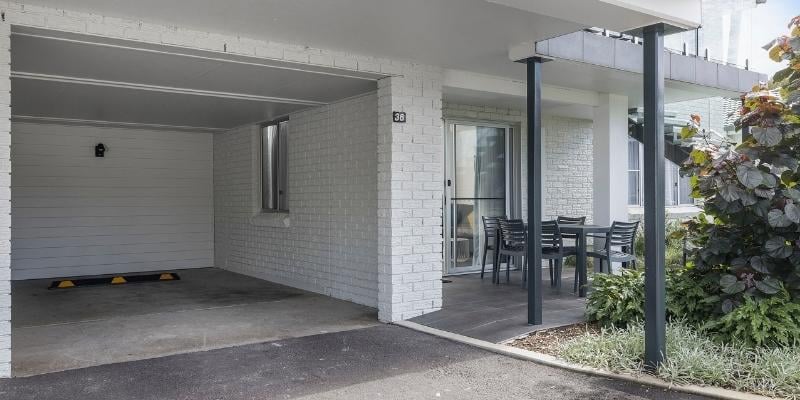 Story-based intervention - My Holiday at Seaside Holiday Resort in Fingal Bay  - Extra wide wheelchair accessible parking spaces and holiday apartment entry